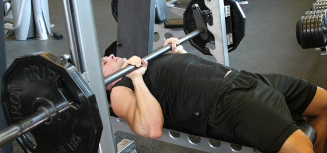 Research Review: Should You Bench Press with a Smith Machine or a Barbell?